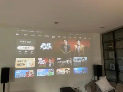 a projection screen on a wall in a room at Bangkok Manor One\u66fc\u8c37\u58f9\u53f7\u5e84\u56ed in Bangkok