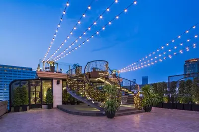 a staircase on top of a building with lights at Hotel Once Bangkok in Bangkok