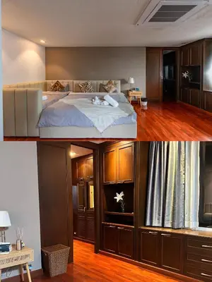 a bedroom with a large bed in a room at Thonglor 25 Noble House in Bangkok