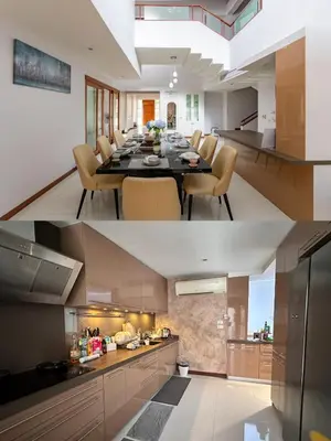a kitchen and dining room with a table and chairs at Thonglor 25 Noble House in Bangkok