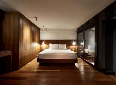a bedroom with a large bed in a room at XX Wish Inn Silom Bangkok - วิชอินน์ สีลม กรุงเทพ in Bangkok