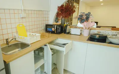 a kitchen with a sink and a counter top at Big unit for 8 people, city center Silom in Bangkok