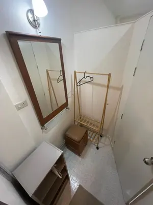 an overhead view of a bathroom with a mirror and a stool at Sairin 1 bedroom BTS Udomsuk in Bangna