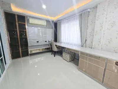 a room with a desk and a chair and a window at Elegant Home near MRT Central WestGate and Central WestVille 3 to 10 Min Drive
