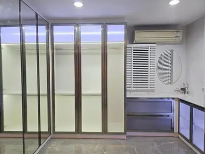 a kitchen with glass sliding doors in a room at Elegant Home near MRT Central WestGate and Central WestVille 3 to 10 Min Drive