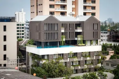 a rendering of a building with a swimming pool at Bangkok Tryp in Bangkok
