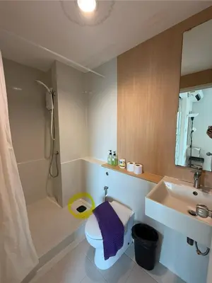 a bathroom with a sink and a toilet and a shower at Cozy7 Living in Bangkok60 m to MRTnear chatuchank in Ban Bang Khwang