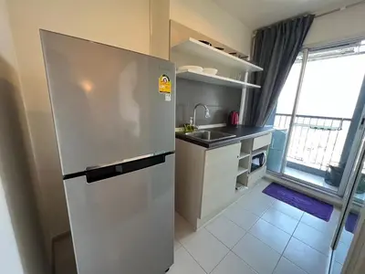 a stainless steel refrigerator in a kitchen with a window at Cozy9Living in Bangkok 60mto MRT in Ban Bang Khwang