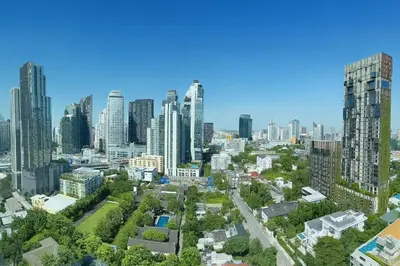 an aerial view of a city with tall buildings at BTS Thong Lor Top Floor City View in Bangkok