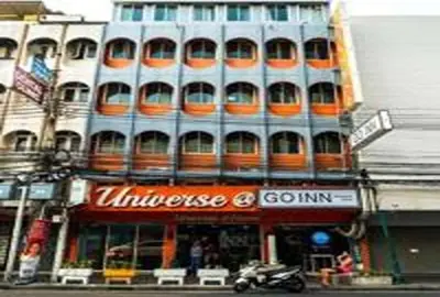 a building with orange domes on the side of it at xx GO INN Khaosan Road Bangkok - โก อินน์ ถนนข้าวสาร in Bangkok