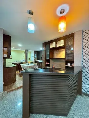 a kitchen with a large island in the middle at 8Pax Spacious Private Home near The Mall Bangkapi in Ban Bang Toei (1)