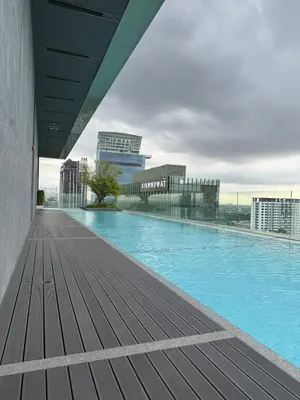 a swimming pool on the roof of a building at Luxury 1 bedroom near Siam Paragon in Bangkok