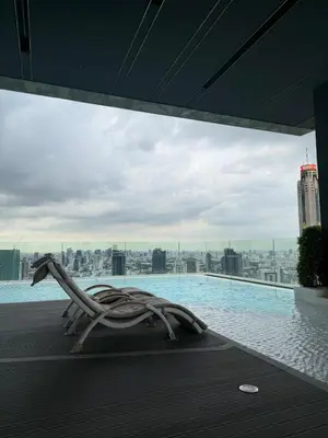 a swimming pool with a view of a city at Luxury 1 bedroom near Siam Paragon in Bangkok