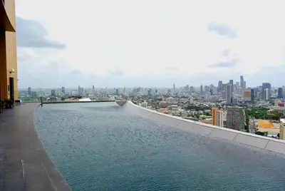 a view of the city from the roof of a building at Upscale High-Rise 1BR - Ultra Fast Wifi - Phrom Phong in Bangkok