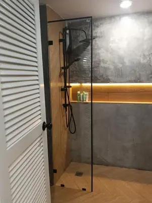 a shower with a glass door in a bathroom at Modern 59m Sukhumvit 1BR - 31st Floor Pool - Gym in Makkasan