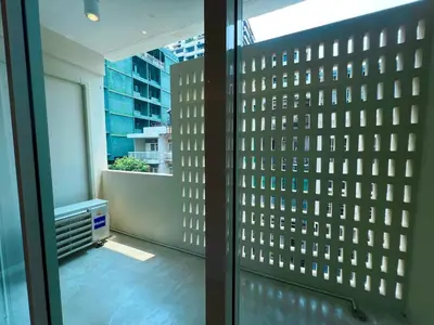 a view of a balcony from a window at Slaap36 5BR Home with Parking, Walk to BTS Ari in Bangkok