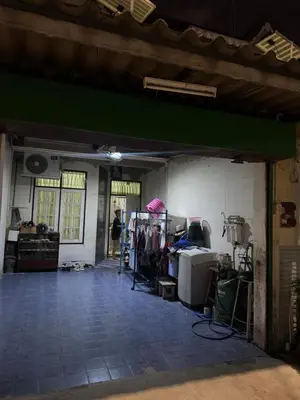 a room with a lot of items on display at Homestay in Tha Akatsayan Don Muang