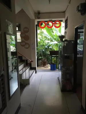 an entrance to a building with an open door at Eco House in Bangkok
