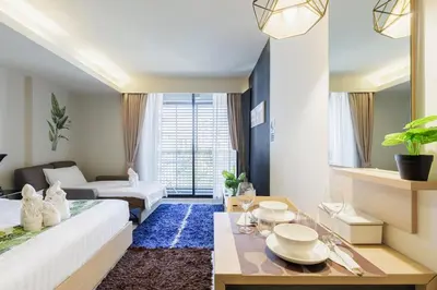 a living room with a couch and a table at Relaxing place in Downtown, BKK in Bangkok