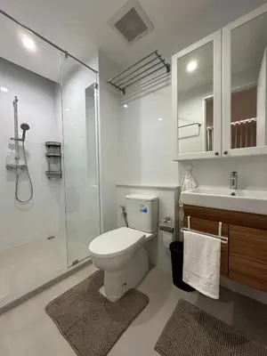 a bathroom with a toilet and a shower and a sink at 6th Avenue Sukhumvit BKK Two Bedrooms BTS Asok Nana MRT Sukhumvit in Bangkok