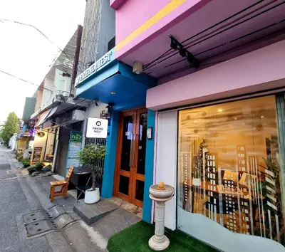 a store front with a toilet outside of it at Friend Nest Bangkok in Bangkok