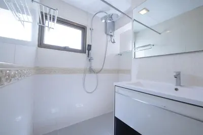 a white bathroom with a shower and a sink at 2Bed Room Condo Near iConsiam & BTS Krungthonburi in Bangkok