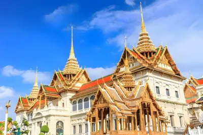 a building with gold domes on top of it at XX Mitr Inn MRT Samyot - ตรอกวิสูตร MRT สามยอด in Bangkok