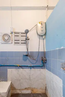a bathroom with a shower and a toilet at Room 1 Homestay Near BTS Bangwa & Train Muaythai in Bangkok