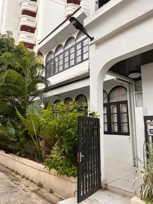an entrance to a building with a black gate at 4BR 12PAX 7min walk to Samitivej Sukhumvit Hospital in Khlong Toei