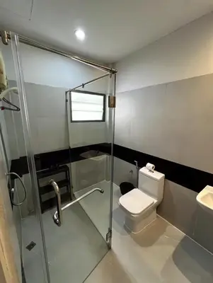 a bathroom with a shower and a toilet and a sink at 4BR 12PAX 7min walk to Samitivej Sukhumvit Hospital in Khlong Toei
