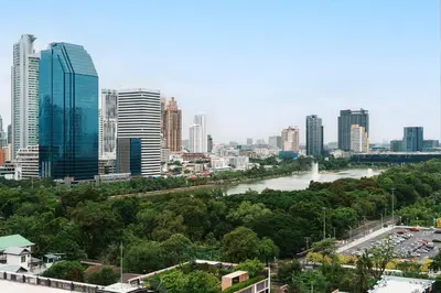 a view of a city with a river and buildings at KingBed|BTS&Park»5min|ParkView|Gym|Washer|FastWiFi in Khlong Toei