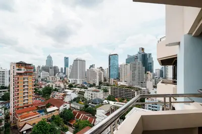 a view of the city from a balcony of a building at KingBed|BTS&Park»5min|ParkView|Gym|Washer|FastWiFi in Khlong Toei
