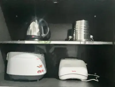 two toasters and a toaster on a shelf at Impact Arena & DMK - 4BR 12pax Home 55