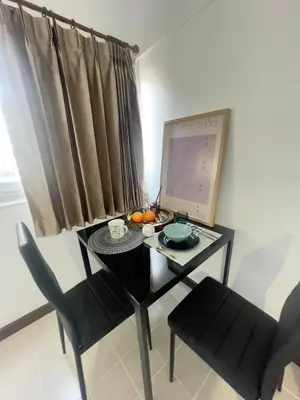 a table and chairs with a computer on it at Lazy Ma-fia C3 Andy in Ban Song Hong