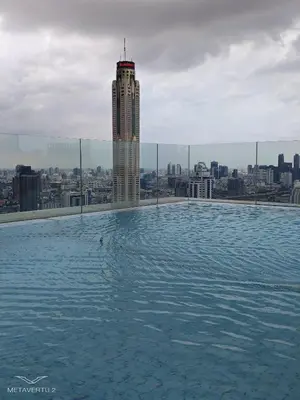 a swimming pool on the roof of a building at Brand New 2 bedroom near Paragon in Pratunam