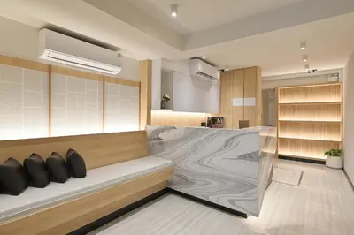 a room with a large bed in a room at Tori primo hotel in Bangkok
