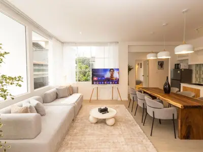a living room with a couch and a table at 3 Bedroom for 6 Guests Family in the Heart of Sathorn in Bangkok