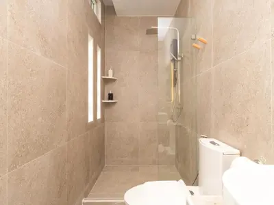 a bathroom with a shower and a toilet at 3 Bedrooms for 5 Guests in the Heart of Sathorn in Bangkok