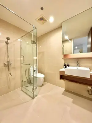a bathroom with a sink and a toilet and a shower at 3BD3BA Condo|City View|Hot Tub|7-11, PoolGym, Mall in Makkasan