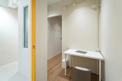 a room with a white desk and a chair at A 3BR apartment for 8 pax on 3Floor in Bangkok
