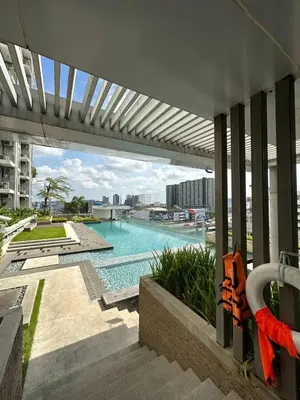 a view of a swimming pool from a building at Sky View at The Parkland Ngamwongwan-Khae Rai by Orn in Nonthaburi