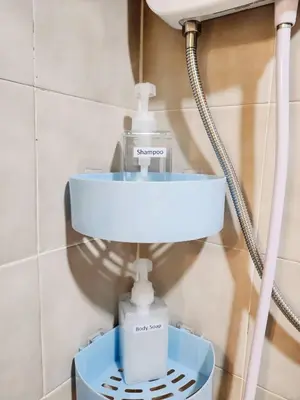 a bathroom with a sink and a light on a wall at 706-STP Homely room Free Wi-Fi and Near BTS in Bangkok
