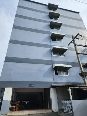 a tall grey building with a lot of windows at 706-STP Homely room Free Wi-Fi and Near BTS in Bangkok