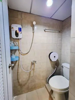 a bathroom with a toilet and a shower at 706-STP Homely room Free Wi-Fi and Near BTS in Bangkok