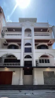 a white building with a lot of windows at House in the heart of Thonglor, Bangkok, 8 min to BTS in Bangkok