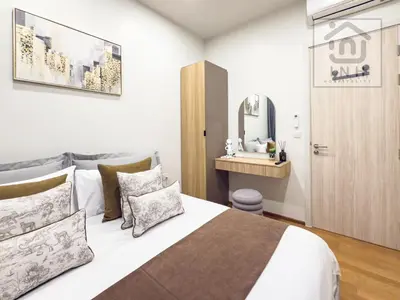 a bedroom with a large bed and a mirror at \u66b9\u7f57\u767e\u4e3d\u5bab\u5962\u534e\u516c\u5bd3 Siam Paragon Luxury Stay #W08 in Pratunam