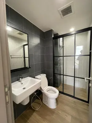 a bathroom with a toilet and a sink and a shower at Private in Bangkapi in Bangkok