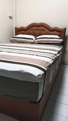a large bed in a room with at Rhythm of love in Bangkok