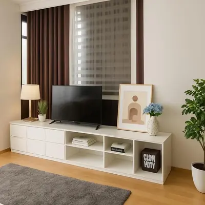 a living room with a television on a white entertainment center at New Renovated 2 Beds Amazing Balcony View Nana BTS in Bangkok