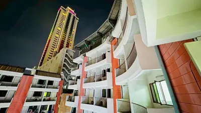 a view of two tall buildings next to each other at Bangkok-Pratunam Hotel in Bangkok